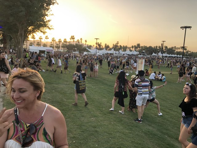 Sunset Gathering in the Grass Field