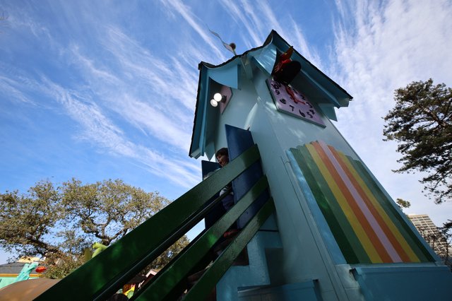 Child Climbing Colorful Rainbow Tower at Fantasyland