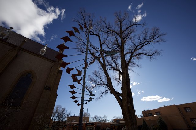 Spiral of Bats Against Desert Sky in Santa Fe