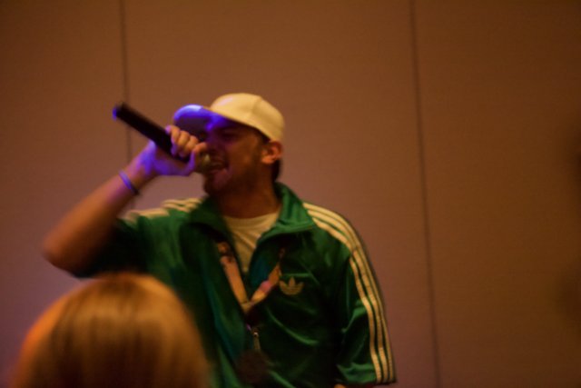 Green Hat, Mic in Hand