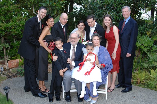 Joyful Family Portrait at Outdoor Wedding Celebration