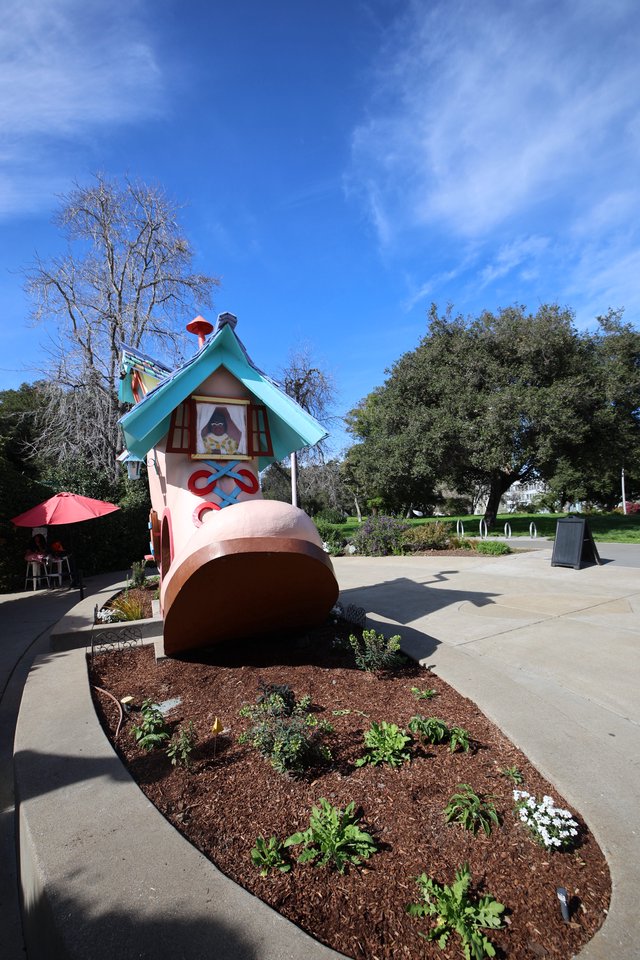 Whimsical Old Woman Who Lived in a Shoe House