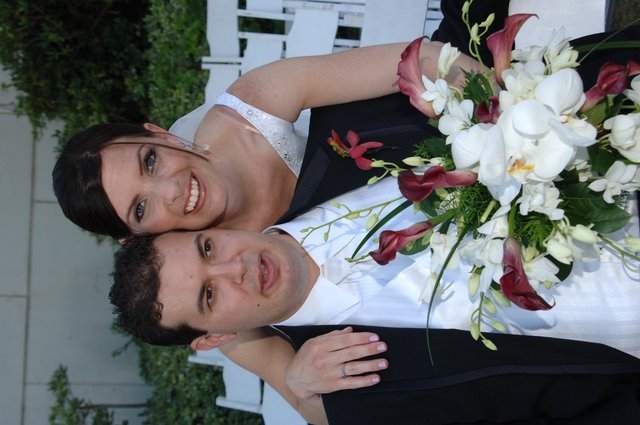 Newlyweds Share a Joyful Moment on Their Wedding Day