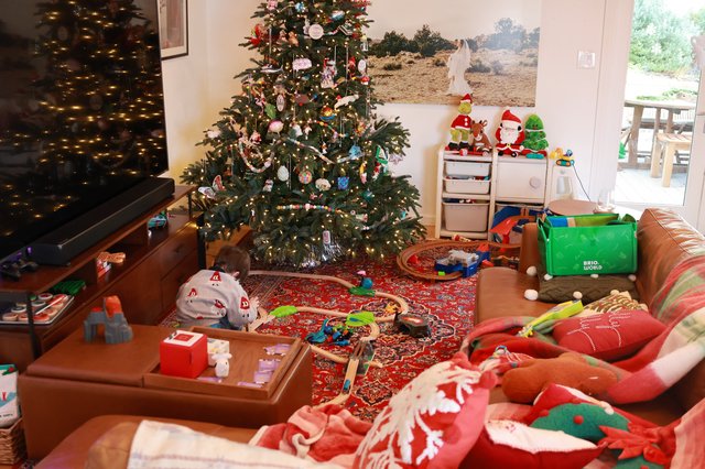 Christmas Morning Chaos: Living Room Full of Toys and Joy