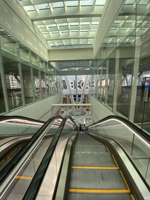 Glass-encased escalator at Salesforce Transit Center