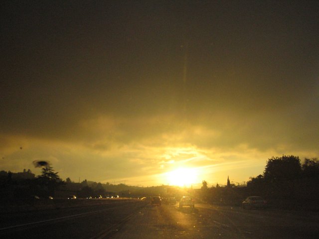 Flare and Light at Sunset on the Highway