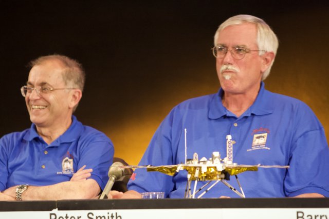 Two Men in Blue Shirts at Phoenix Landing Press Conference