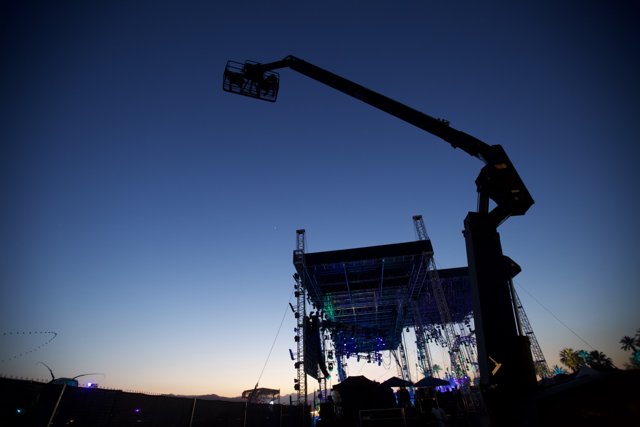 Elevated Stage Silhouette Against Dusk Sky