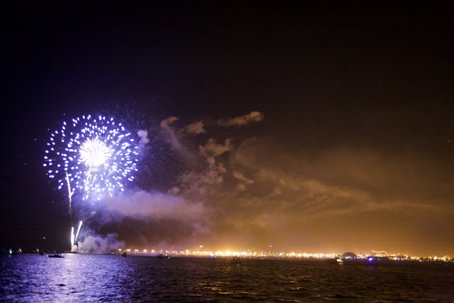 Boats Witness Fireworks Display over the Water