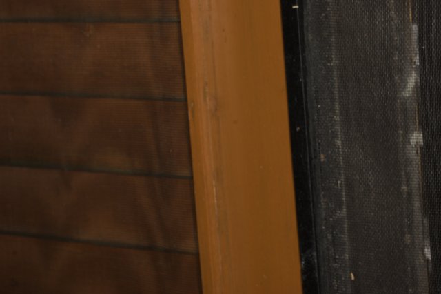 Rustic Wooden Door with Black Handle