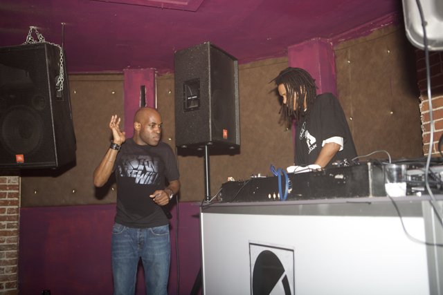 MC Q and a Friend at the DJ Booth