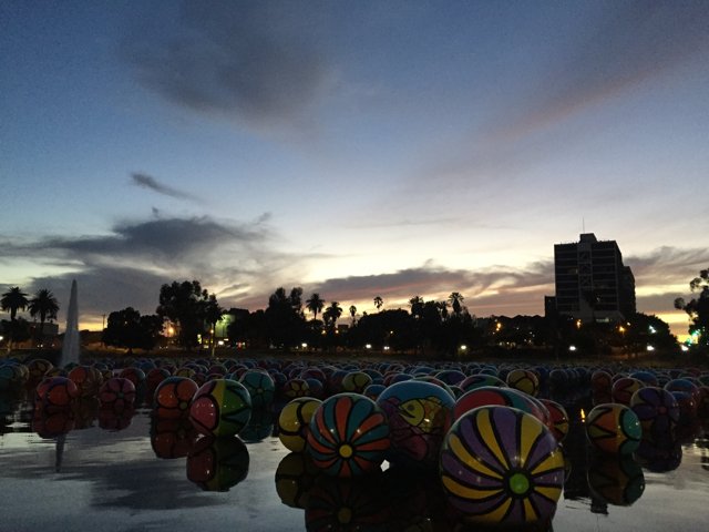 Colorful Balloons Reflecting on MacArthur Lake