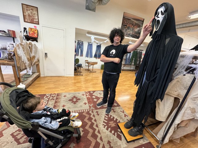 Spooky Shopping: A Man, a Baby, and a Giant Ghost