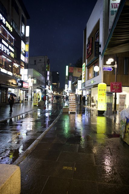 Urban Reflections: A Rainy Night in Korea