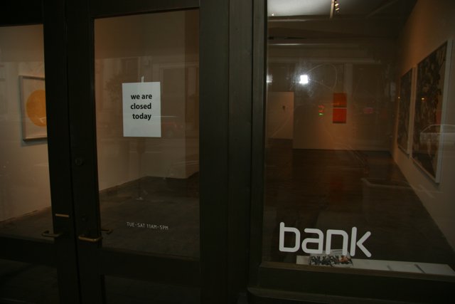 Bank Sign on Hardwood Floors