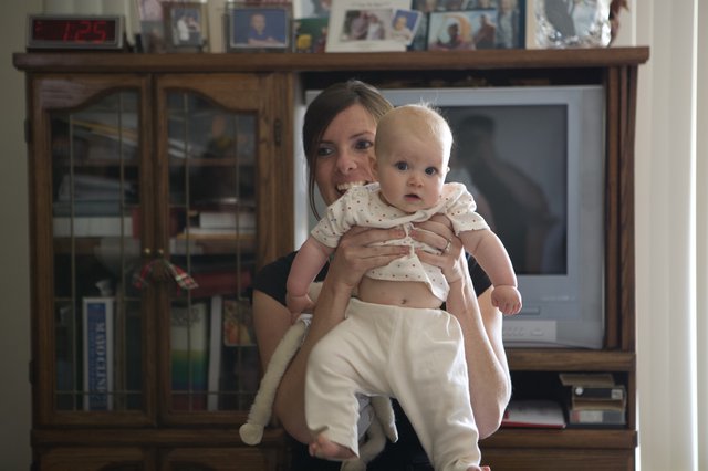 Mother and Baby Share a Playful Moment at Home