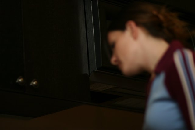 Blurred Profile in Dim Kitchen Light