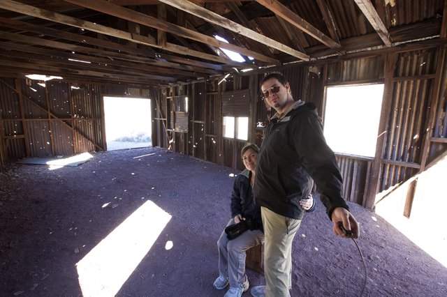 Explorers Inside Abandoned Desert Shack, Death Valley