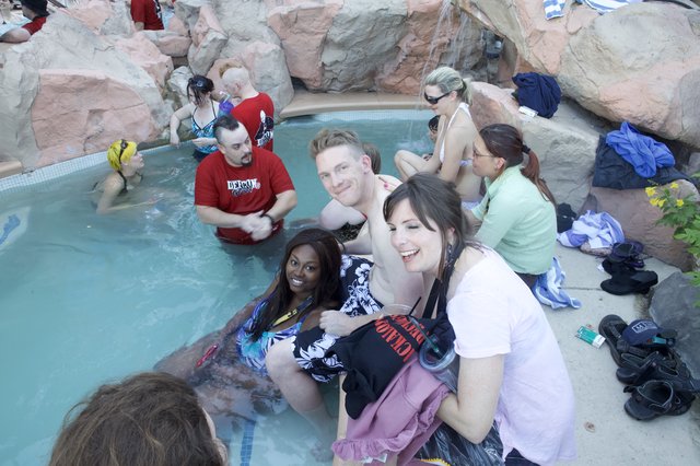 Friends Socializing at Pool Party During DEF CON