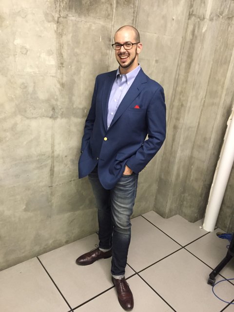 Standing tall in a blue blazer