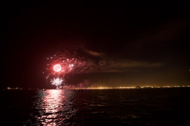 Spectacular Fireworks Show over the Water