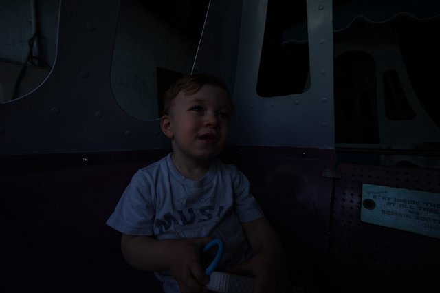 Young Child's Wonder at Fantasyland Attraction