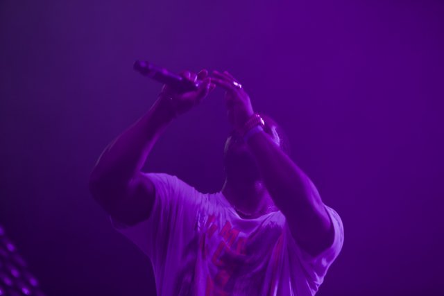 Solo Performance in Purple Lighting