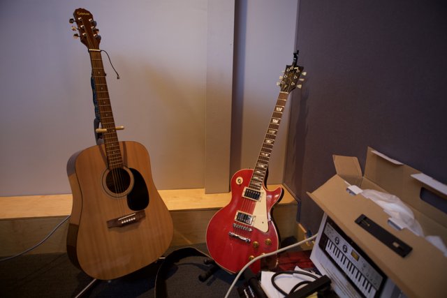 Two Guitars Ready to Play