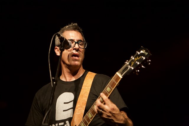 Brett Gurewitz: Rocking the Stage with his Electric Guitar
