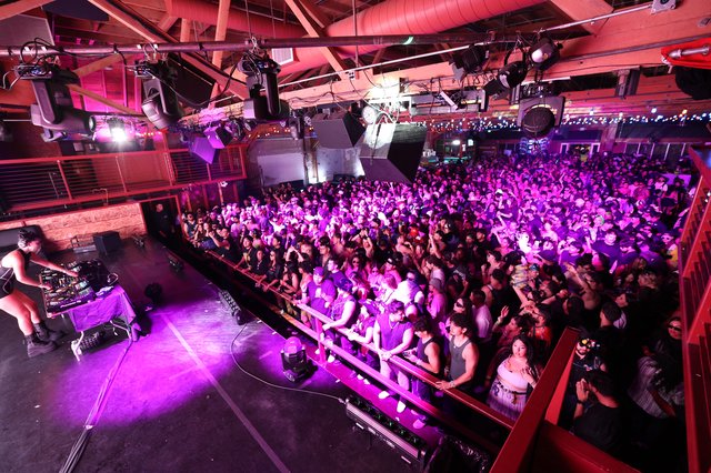 Massive Crowd Pulsates Under Purple Lights at Wobbleland