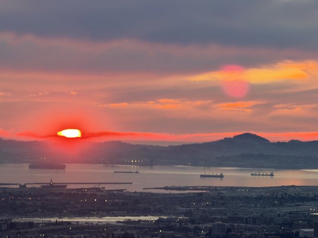 Sunset Over San Francisco Bay with Cargo Ships