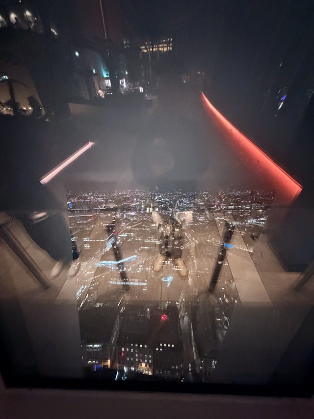 Glass Floor View Over London Cityscape at Night
