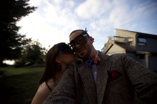 Masked Couple Shares a Tender Moment at Wedding