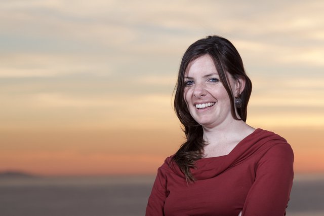 Smiling Woman at Golden Hour Sunset