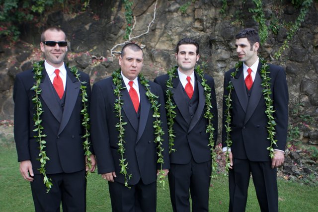 Four Suave Men in Suits and Ties