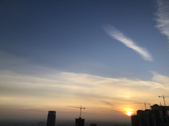Sunset behind the City Skyline