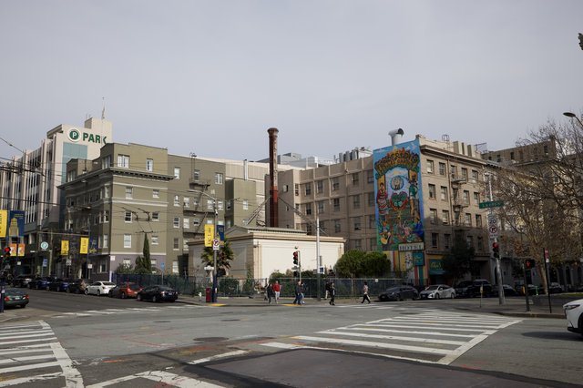 Urban Street Corner with Colorful Mural in Overcast San Francisco