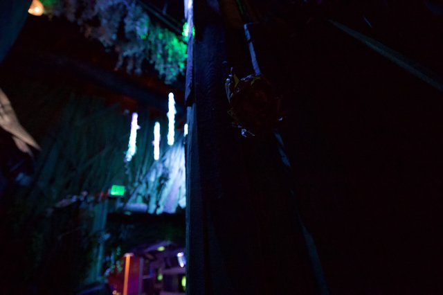 Neon-Lit Underground Passage with Silhouetted Figure
