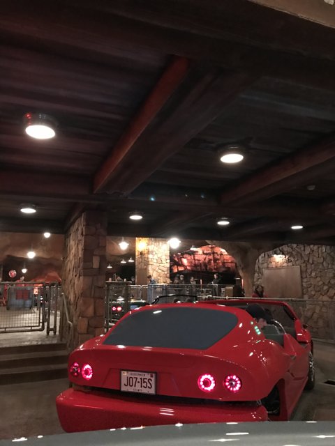 Red Sports Car in a Disney Garage