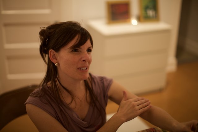 Penelope in Warm Conversation at Gallery Opening