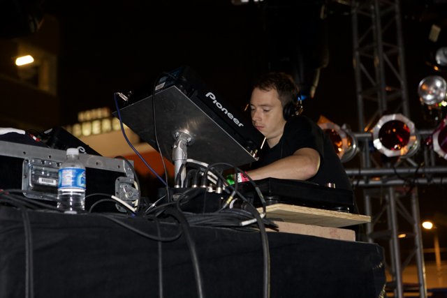 DJ Entertains the Nocturnal Crowd