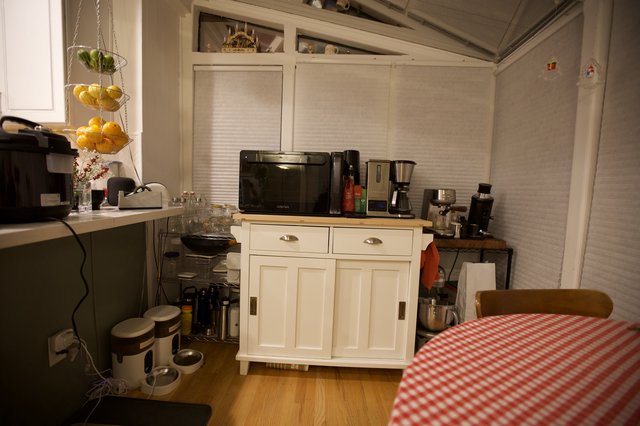 Cozy Kitchen Corner with Vintage White Cabinet