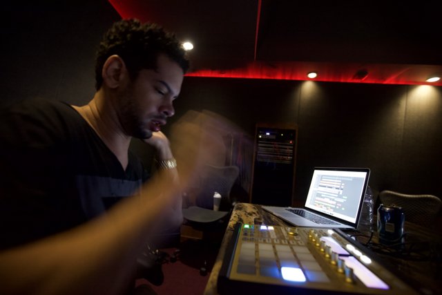 Marc Kinchen creating beats with his trusty laptop
