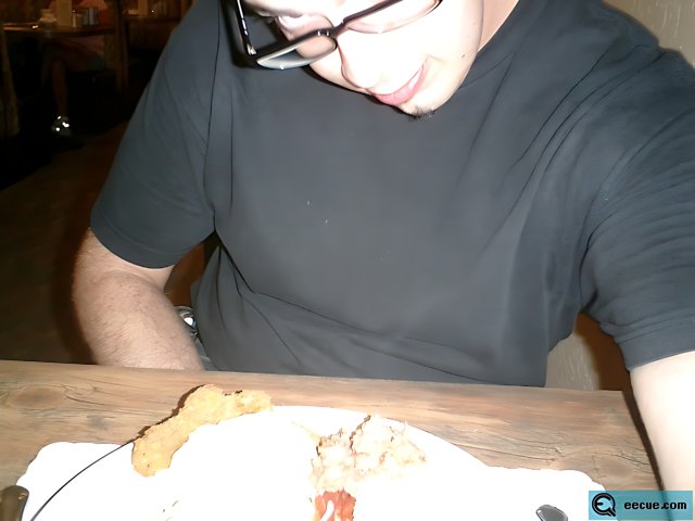 A Man Enjoying His Meal