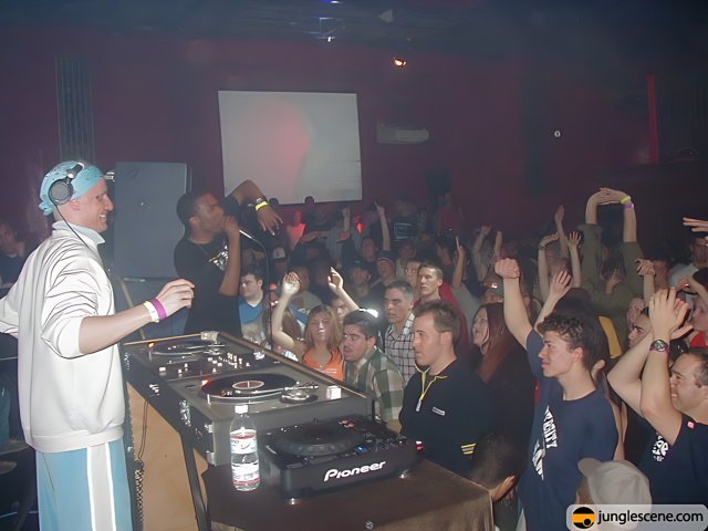 DJ rocks the nightclub crowd