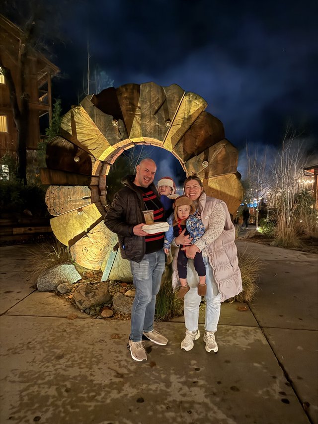 Family Christmas Portrait at Illuminated Turkey Sculpture