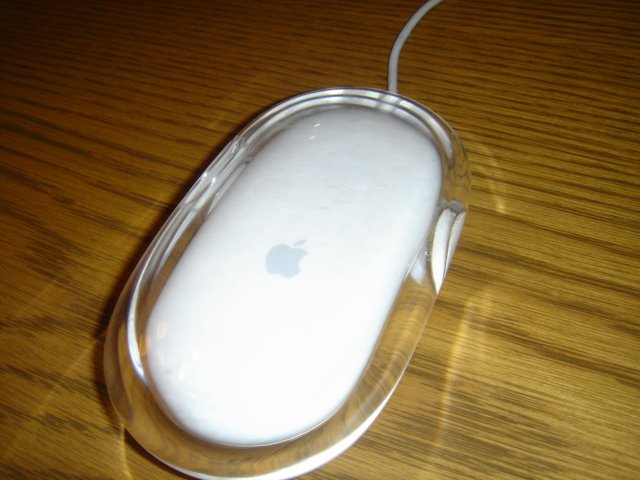 Drink in Hand with the White Apple Mouse