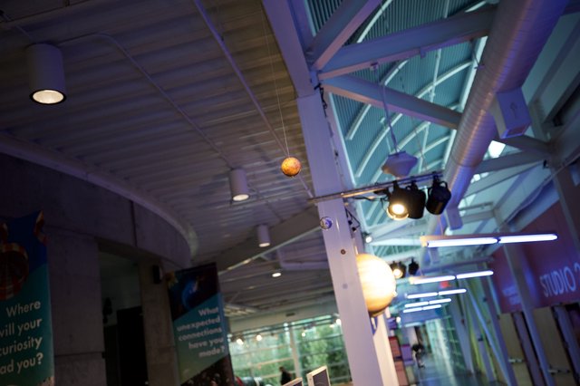 Modern Museum Interior with Colorful Lighting and Industrial Design