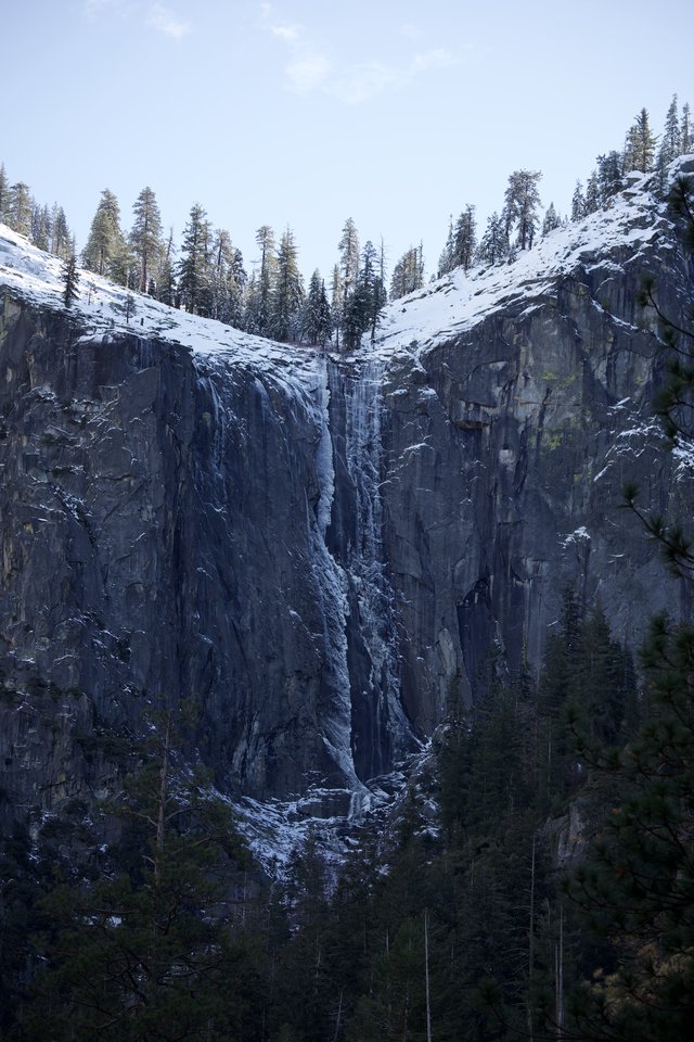 Frozen Waterfall Cascading Down Yosemite's Granite Cliffs
