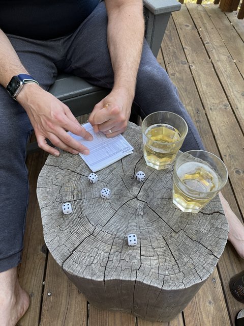 Dice Game on a Wooden Deck